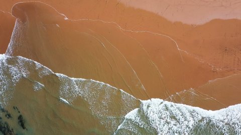 Aerial top shot from ocean waves