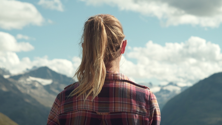 Happy woman on mountain standing arms wide open embracing nature and life. Balance, people enjoying outdoor activities and freedom  Royalty-Free Stock Footage #1053082076