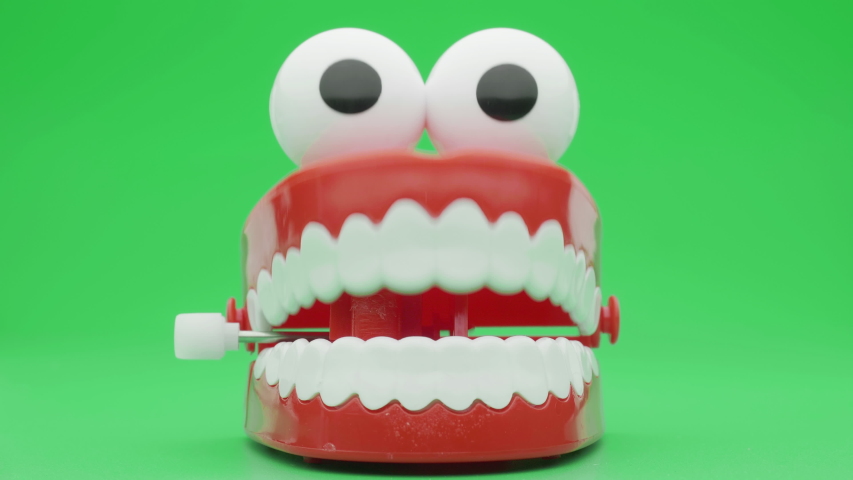 Toy teeth. Moving funny tooth model toy. | Shutterstock HD Video #1053084140