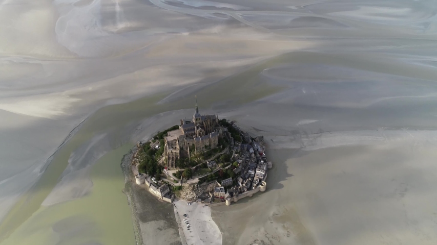 Aerial pan down view of Le Mont Saint Michel or St. Michael