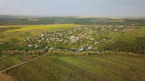 Flight over small village in Moldova republic of. 4k aerial footage.