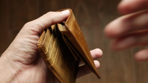 Man bankrupt arrears showing empty wallet with no money. Poverty finance business bankruptcy concept. Male debt businessman showing empty wallet. Financial crisis of getting into debt. no money on