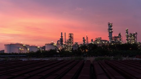 TimeLapse manufacturing oil refinery terminal is industrial facility for storage of oil and petrochemical. oil manufacturing products. power electric plant. Time lapse Day to Night b roll video 4k.