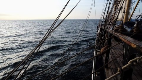 Tall Ship at sea in the English Channel filmed from the port side of the ship looking out with the boat in view.