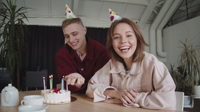 Young woman and man celebrates birthday during quarantine. Virtual birthday party online with her friend or lover. Video conference. Social distance, stay at home, self-isolation. Couple and family. - Powered by Shutterstock - Get 15% off with code: PIKWIZARD15