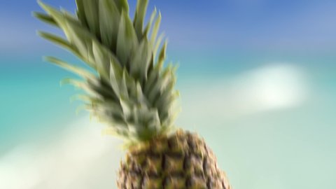 Flying of Pineapple and Slices in Beach Background