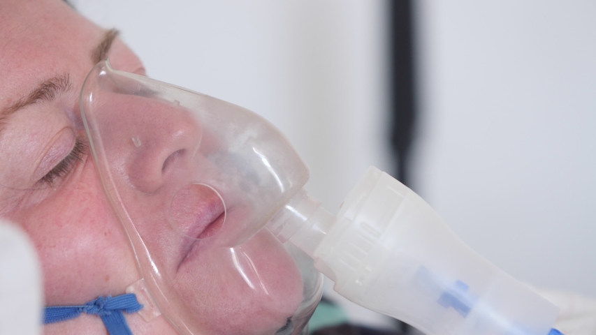 woman-s-face-oxygen-mask-her-eyes-stock-footage-video-100-royalty