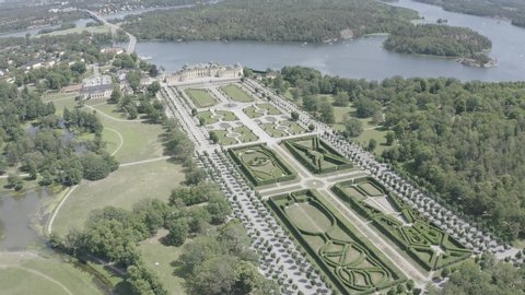 D-Log. Stockholm, Sweden - June 23, 2019: Drottningholm. Drottningholms Slott. Well-preserved royal residence with a Chinese pavilion, theater and gardens, Aerial View, Departure of the camera