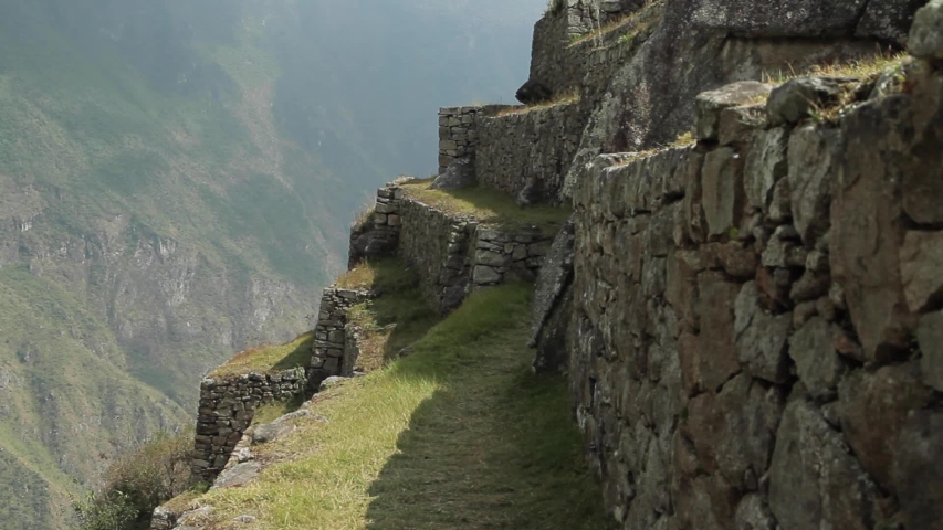 Stone walls,mountains in sacred plaza, Machu Picchu, Cusco, Peru