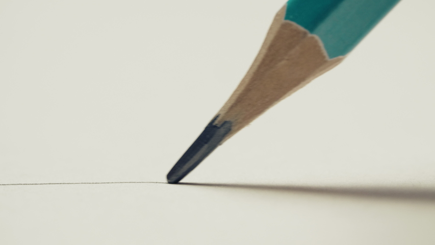 Graphite pencil draws a straight line on a white background paper, macro shot Royalty-Free Stock Footage #1053214829