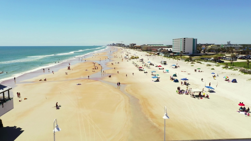 Aerial footage Daytona Beach allowing people during Coronavirus Covid 19 pandemic