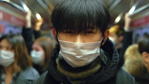 Asia Infect Corona Virus. Face Mask Covid-19 Subway Tube. Chinese Passenger. Epidemic Coronavirus Asian Man. Pandemic Flu Corona Virus. Crowd Masked 2019-ncov. Train Metro China. People Sick Covid 19.