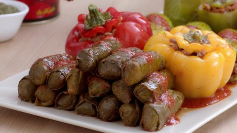Dolma dish on a table served by the chef.