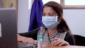 Sick Girl in medical mask talking or having chat with doctor on video conference - telehealth, telemedicine or tele counseling with Nurse or Doctor during coronavirus or covid-19 crisis.
