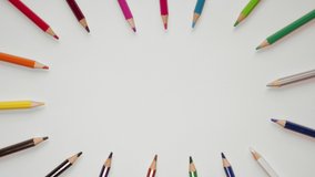 Wooden school pencils of different colors are located on the white surface. Stop motion animation with colored pencils for use in infographics on school topics. Appearance, blinking, changing colors - Powered by Shutterstock - Get 15% off with code: PIKWIZARD15