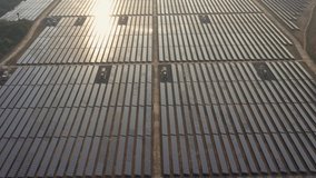 Footage B roll of Aerial drone view looking downwards into large solar panels at a solar farm. Solar cell power plants. Green Energy sun power. footage video 4k.
