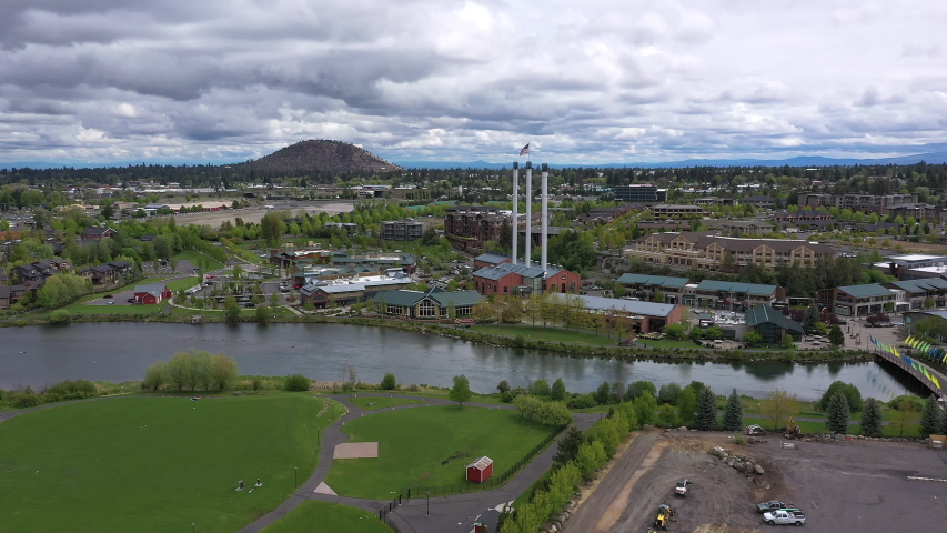 Aerial view of Bend Oregon flying along the Deschutes River looking across the landscape.