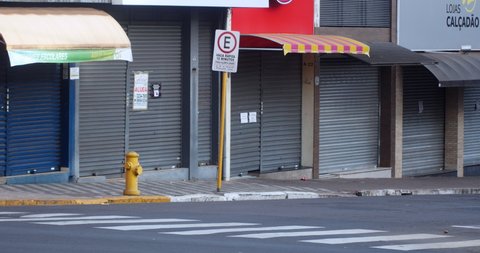 SAO PAULO, BRAZIL, circa May 2020: Shop store fronts closed due to Coronavirus Covid-19 Pandemic lockdown