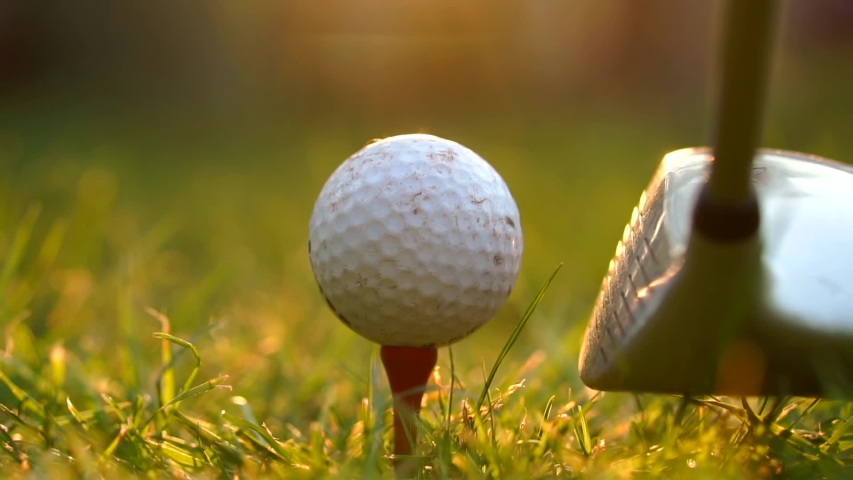 Cinematic Golfer At Sunset, Close Up Of Ball Hit Off Tee In Golf Drive Shot. | Shutterstock HD Video #1053273698