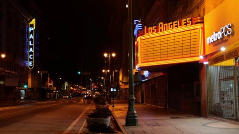 Los Angeles, CA/USA - April 20, 2020: The Historic Broadway Theatre District in Los Angeles is deserted at night during coronavirus quarantine
