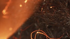 Macro footage of hot glowing metal filaments burning in slow motion. VG, Visual metaphor for brain neurons and mental stimulation.