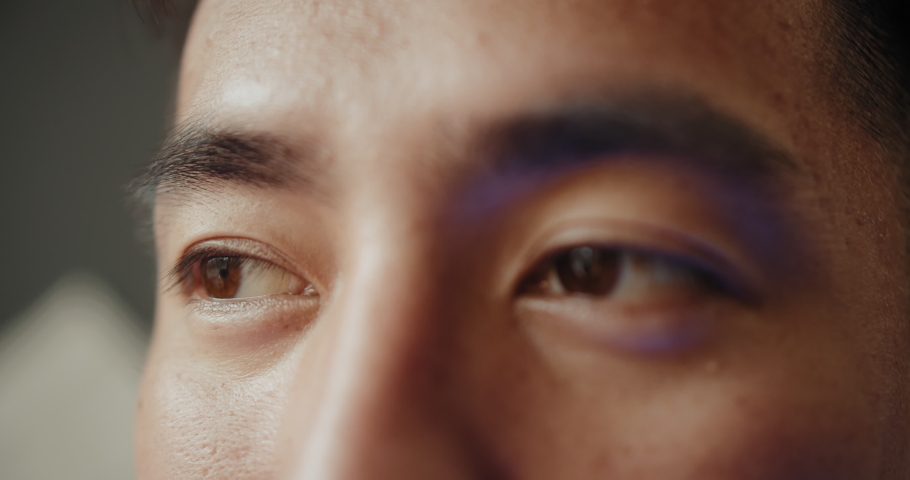 Japanese Asian man eyes close-up detail macro shot, portrait macro of man Royalty-Free Stock Footage #1053327590