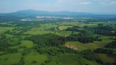 Aerial view of Postojna, Slovenia, mountains and forest landscape
