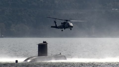 Military submarine into Bosporus waters with S-70B-28 SEAHAWK helicopter