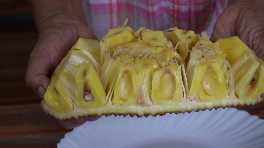 Jackfruit with hands and slow-motion clips.