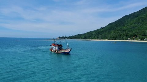 Thai fishing trawler in island bay