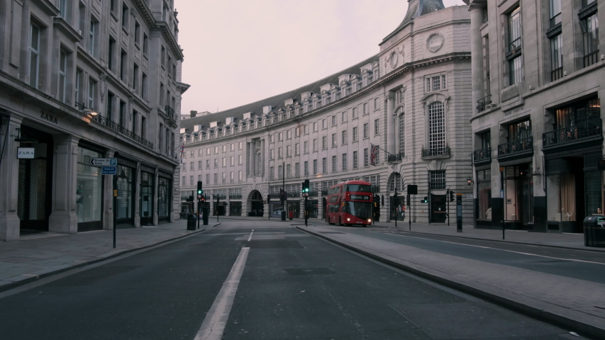 Bus driving in empty London streets during Covid19 Royalty-Free Stock Footage #1053384059