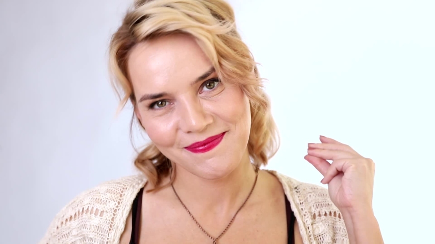 portrait of a girl on a white background with active facial expressions