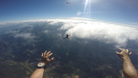 May 22, 2018, Rio de Janeiro Brazil. Skydivers friends jumping over the Atlantic sea.
