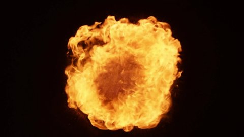 Fire ball explosion. Fire ball explosion towards to camera isolated on black background