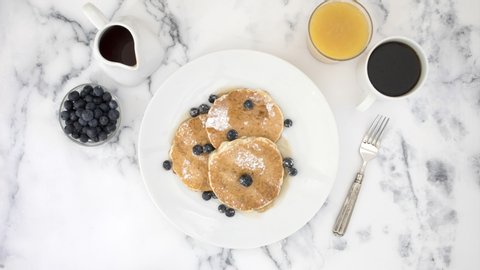 Стоковое видео: Stop  Motion Video of Blueberry Pancakes Being Eaten