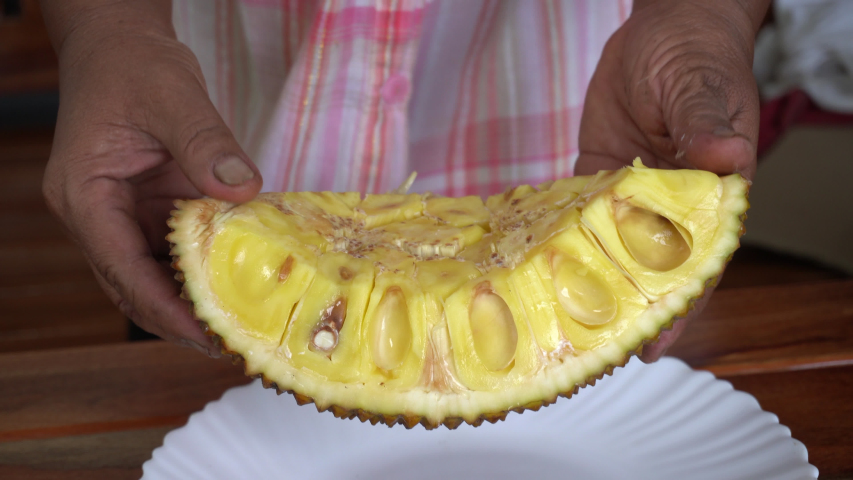 Jackfruit with hands and slow-motion clips.