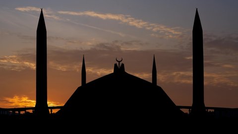 Faisal Mosque, Time Lapse at Sunrise with Colorful Sky and Silhouette of the Masjid in Islamabad, Pakistan