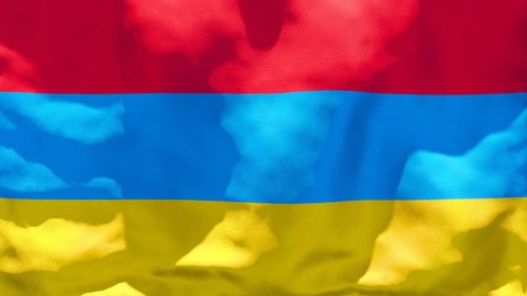 The national flag of Armenia is flying in the wind