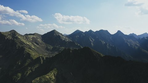 Drone shot of rocky mountain range skyline. Pyrenees, Andorra, 2020
