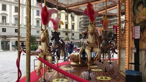 children's carousel with horses on Republic square. Florence, Tuscany / Italy - may 31, 2020.