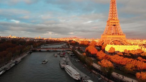 Aerial close up view of Paris Eiffel Tower Tour de Eiffel and panoramic view over Seine River and Paris city attractions at sunset