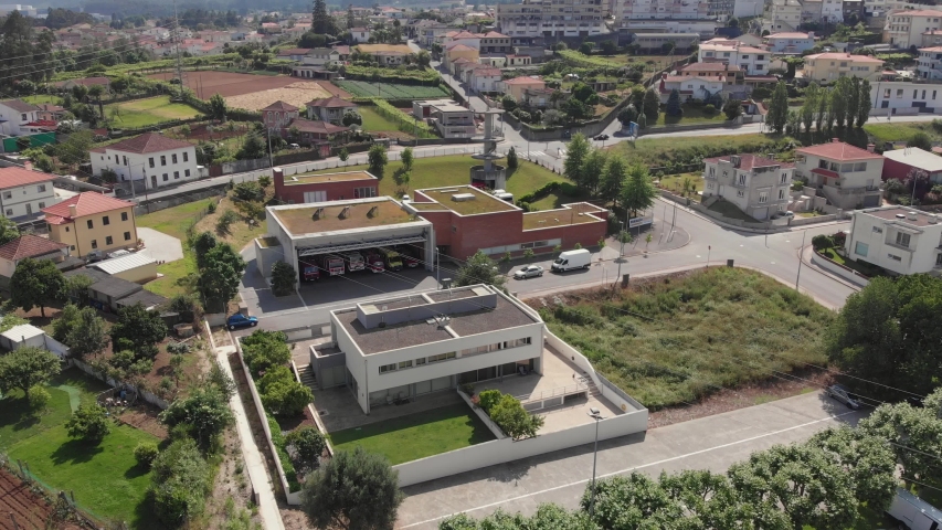 AERIAL DRONE FOOTAGE - The Santo Tirso Volunteer Firefighters Humanitarian Association fire station (Bombeiros Voluntarios Santo Tirso) in the district of Porto in Portugal.
