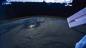 ISS Time-lapse Video of Earth seen from the International Space Station with dark sky and city lights at night over North South USA, Time Lapse 4K. Images courtesy of NASA.