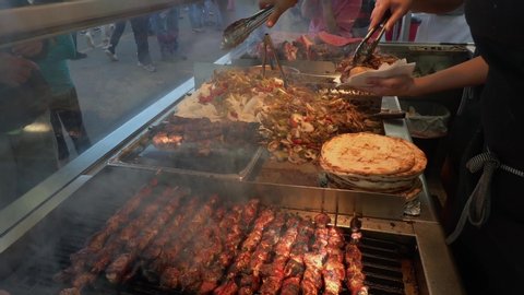 steak kabobs on the grill at a food stand during the North Carolina State Fair
