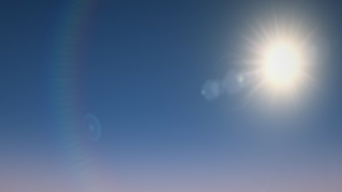 Beautiful night to day transition timelapse video. Sparkle sun moves across clear blue sky. Dynamic light rays, lens flare effects. Sunrise and sunset. Nature concept animation. Seamless loop 4K video