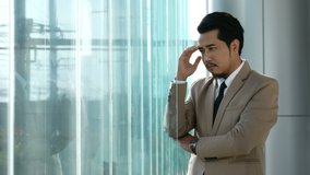 young stressed business man thinking about problem in office. 4k video