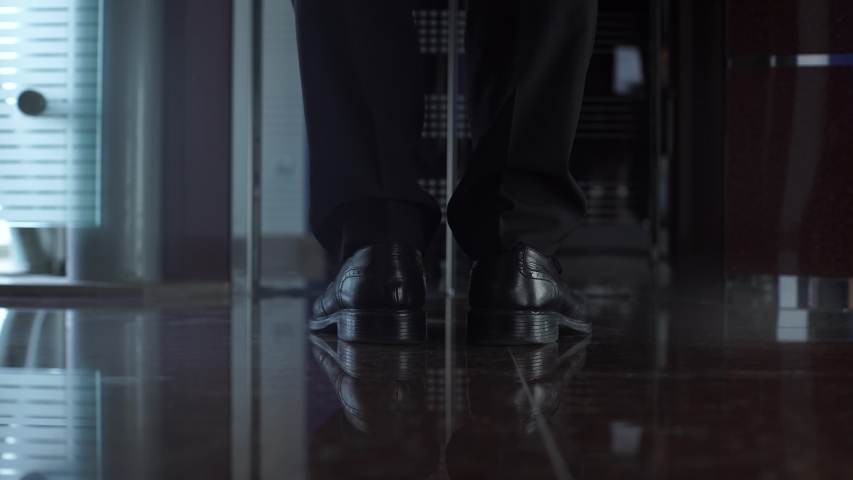 Man in suit and black shoes entering into the modern elevator. Elevator's doors open male legs in black shoes enter into the elevator. | Shutterstock HD Video #1053549908