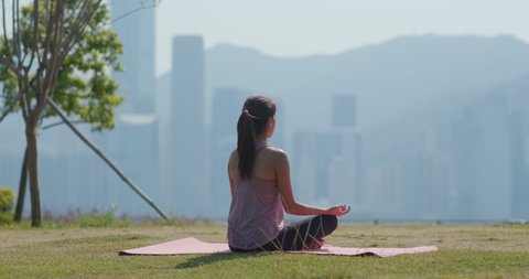 Woman enjoy yoga at park