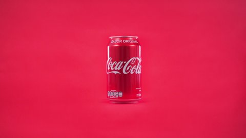 Mexico, Mexico City - May 16, 2020: Camera spin of a can of coke. Coca-Cola is a carbonated non-alcoholic beverage sold all over the world.