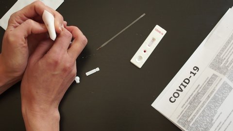 Rapid test covid 19. Test cassette and a kit of reagents for self-sampling of blood for analysis on coronovirus covid-19. Assessment of the test result. Negative test SARS-CoV-2. Part 3